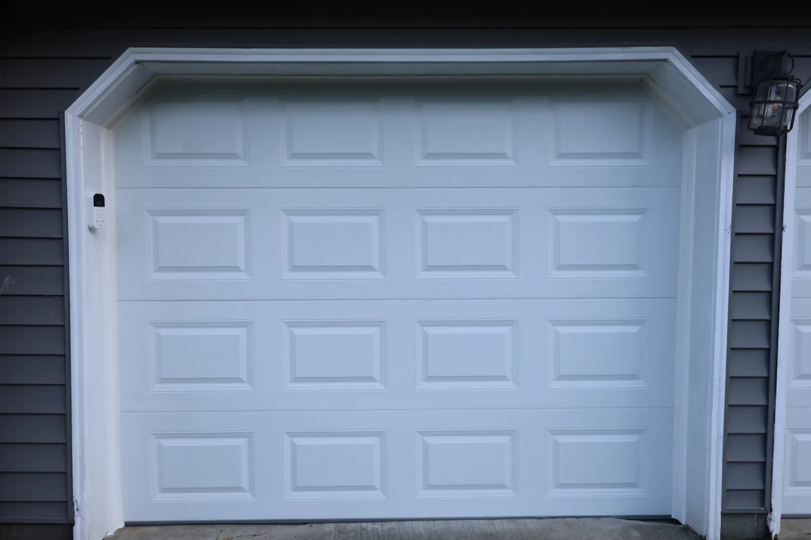 Insulated CHI overhead garage door on a two car garage in Brownsville, PA, installed by Bear Door Services